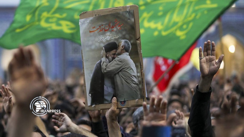 Crowd Holding Poster of Qasem Soleimani
